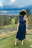 I received so many compliments on this dress. It's absolutely gorgeous. The shiny material and ruffles in this dress makes it seem like it's multicolored, giving it beautiful depth. It fit well, but maybe a tiny bit lose in my chest. - Hannah M.