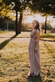 This dress is so dreamy. Elegant, flowy, simple yet capturing. I got it in taupe since I have an olive complexion. Totally suits me! I bought an XS because my cup size is pretty small, so the straps stay better, and my rib cage isn't that wide. The dress is a bit long for my height (5'2") but I'll keep it flowy like this. Got it for a family photo shoot but know that I will wear this dress to any event! - Laila R.