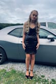 The dress is pretty much exactly what is in the picture. Ordered it for my daughters homecoming dance and she looked beautiful. I was afraid it would show up and look cheap and be scratchy but neither were true. She loved the dress and felt amazing wearing it! - Ciara C.