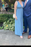 Loved this jumpsuit! I received so many compliments on it! I wore it to a wedding and it was perfect combination of flow in the legs and structure in the bodice! Definitely needed some tape to hold the girls in place but there was enough material I didn't feel like anything was going to be shown that I didn't want! - Desiree S.