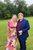 I got so many compliments on this dress. Like others have said if you have a bigger chest I'd size up. The large fit perfect but was so worried the girls were gonna come out. I used lots of tape to keep it down. I just ordered the blue one for a December wedding! - Amber S.