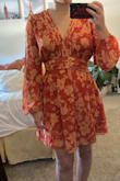 The material around the neckline is too scratchy for my skin. Beautiful color in person. Fits nicely just a little baggy in boob area. - Kendra T.