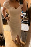 I was looking for something that straddled the line between sexy and sweet for my rehearsal dinner outfit and I found it in this dress. I answered the fit finder questions to figure out what size to buy and got the perfect result ' it fits like a glove and shows off my curves. Can't wait to wear it next week! - Emily F.