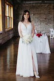 I wore this dress for my wedding, and it was absolutely perfect. Very comfortable and very well-made! I did have to get the length altered and I added a new back clasp because the existing one seemed flimsy. I love the corset back, it gives you the ability to fit the dress perfectly to your body. It moves beautifully & flows while you walk, the slit is super sexy too. I got so many compliments! It definitely looks more expensive than it is! I felt so confident & beautiful! I couldn't have pictured myself in any other dress! - Abby J.