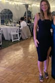 Fit true to size and was a very flattering black dress. - Taryn M.