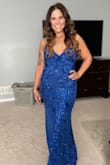 I ordered this dress in a large only because I was afraid it would run small. I am a size 6 with broad shoulders and muscular build. This was the best dress. Comfortable and easy to move in. I would repurchase in a medium but for now will just get it taken in. - Valerie P.