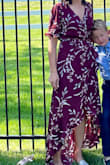 I liked the fit of this dress. I usually would wear a small in brands like banana republic and gap but a medium fit with the Lulus dresses. This wrap dress fit better for me than others on the website because it closed higher on the chest. I did pin the bottom together a little because when you walk I was afraid it was flying open a little high, but as a mom with 3 kids I am a little more aware of how high my dress is maybe compared to others. - Rebecca M.