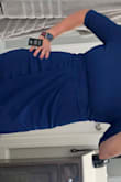Very flattering, but snug across the mid back. I don' know about being able to get it zipped! - Jennifer W.
