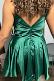 The dress looks beautiful on and it is so flattering. I ordered an 8 when I'm usually a size 6 and it fits perfectly. - Christina S.