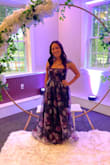 Fits really great and I got lots of compliments at the wedding I wore this to. The skirt is nice and full but because of that the slit didn't really show, even while walking. Not a big deal, just something to note. I am short so I did have to get it hemmed. - Nicole R.