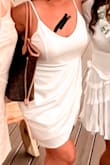Wore this dress for a party on a boat. I've got some hips but the layers of the dress was flattering. I don't wear bodycon dresses but this was perfect. - Jennifer L.