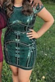 My teenage daughter wore this dress to homecoming and, let me tell you, it was absolutely stunning. She looked so pretty in it. She's curvy and it fits perfectly. Not too short or revealing but still stylish. She said it wasn't stretchy but still comfortable. The detailing is so pretty and gives it that extra something to set it apart from all the other dresses we saw. She got so many compliments! - Tiffin K.