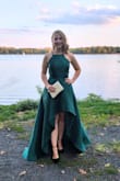 This dress is beautiful. The fabric is thick and heavy. I wore it to a formal wedding and got many compliments. As others have mentioned, the waist does not have any give. It felt fairly tight when I was sitting but perfectly fine when standing, so I'm glad I ordered true to size. For my short ladies, know that this dress is long in the back. I'm 5'1" and didn't want to have the dress hemmed, so I wore it with 4" heels, and it still dragged a bit in the back. I decided to chance it when I was ordering because I figured with the high-low style, I knew I wouldn't trip when walking. But I did have a couple of instances where people stepped on the back, and I didn't feel that I could take my heels off all night or I would've had a really long train so bear that in mind! Tag says iron on low heat; had to turn the heat way up to get the creases out (it comes folded in a bag) but it didn't seem to hurt the dress. My only real complaint is that the straps are not easy to adjust. By the way, I didn't have to wear a bra! - Chelsey T.