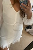 It was heartbreaking getting this dress. It fit like a glove but there was a black stain on the seam line and the button on the back not attached but in the bag. I returned this. - Emily R.