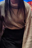 I absolutely love this piece. It's so soft and comfortable and it looks exactly like the picture. The loose sleeves are so cute and the cut makes it very versatile whether you want to keep it loose and out, or if you want to tuck it in. Definitely a new winter staple of mine. 
I've paired it with an asymmetric skirt in the picture but I'm sure it'll look nice with trousers too! The colour can look a bit different depending on the light but it is actually the colour in the photo. - Mhairi I.