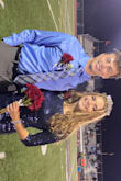 I wore this dress for the Homecoming football game. It navy set me apart from the other girls on court who wore black. It has just the right amount of sparkle and the sleeve length was flattering. I was crowned Queen, so the dress must have worked! - Kate E.