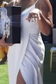 I ordered this dress at the last minute for my bridal shower. The dress arrived just in time and it fit perfectly. No alterations were needed and I loved everything it. I received so many compliments on this dress! 

The material is a little thin so proper undergarments will be needed. - Tolya W.