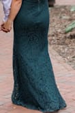 The perfect length to where it hit the floor but didn't drag too bad. The straps are thin but durable to hold it up. No bra is needed. Doesn't show a v-string line. The slit is high enough to feel comfortable and not show too much. - Haley R.