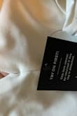 I've ordered from Lulus dozens of times and never had this experience; however, this jumpsuit was a complete fail. As soon as I took it out of the bag, the first thing I noticed was the seam splitting in the front and the silver metal piece showing through. I figured I'd try it on to ensure the correct size and just return for a replacement; however, when I flipped it over, the zipper was clearly broken. The jumpsuit arrived fully zipped with the zipper off-track and stuck firmly in place. Despite my best efforts, and even the attempt of my fiancé, we weren't able to dislodge the zipper so that I could even try on the jumpsuit to check if this would be my correct size. I'm so disappointed in this order from Lulus and am now 4 days away from my engagement photos with nothing to wear. - Lauren Z.