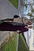 The dress is a dream! It fits perfect and is a real show stopper. The material is great. I went with the size S, I decided this based on the picture reviews and I wanted I slimmer fit. I do suggest a size smaller tho, as I don't really concider myself a size S. - Leja T.