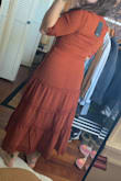 Very cute, the color is exactly as pictured, and very flattering. It is see-through but comes with a slip. I'm short and it hit about 3 inches above my ankles, maybe 4 with heels on. I wore it to a cocktail attire wedding and received lots of compliments.
It was a little tight on the chest area when moving arms all the way back but not uncomfortably. Very flattering overall. - Margot L.