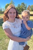 Beautiful dress! Ordered it with 9 others for my little sister's quick wedding day. This one was her favorite and it turned out beautiful. She's normally a medium and we ordered a large to be safe. I'm happy we ordered up a size. - Hope C.