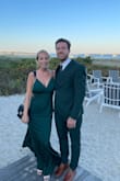 This dress fit true to size. The material was very high quality. The buttons down the back was such a cute touch! The color is gorgeous in person. - Blair B.