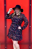I'm normally a large but I've figure out with the not so flexible materials XL is a lot more comfortable. Only complaint is the sleeves were too long but I loved the dress. Super fun and flirty and great for fall wine tasting!

So my only warning: it tears easily. I hand washed it cold after I wore it and now there's a tear in a place I can't hide. Not sure what I did to cause that... - Nicole B.