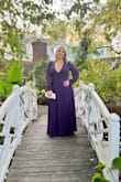 Fits true to size. Very deep V neck i used double sided tape to keep in place.  Had to have it altered because it was to long.  alterations cost me more then the gown itself.   Paired it with silver shoes and accessories.  Was perfect for a fall wedding! - Nicole I.