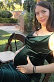 I bought this dress as it popped up in my search for "bump friendly" wedding guest dresses. It fit perfectly and was so flattering in all the right ways. I wore it at nearly 19 weeks pregnant and it was soooo comfortable. Highly recommend. - Elizabeth R.