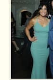This dress was stunning and great quality. Fit a little tight but wouldn't change the size. - Joanna C.