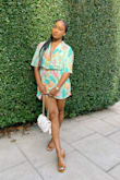 Beautiful colors. Oversized, and adjustable with the included belt. It's actually a bit longer, but I cinched it to fit better for my height. - Carla N.