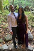 The dress fit perfectly true to size. I'm usually between medium and large so I went with the medium on this one because it is very stretchy. The ruching in the middle is very flattering and the length is perfect. I wish the slit wasn't quite so high but I made it work. Very comfortable dress! - Alex L.
