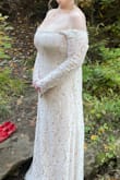 This dress was absolutely perfect for my fall vow renewal. I had my heart set on long sleeves but didn't want a totally open back as so many long sleeve dresses have - except this one. I tried on a few dresses in the $1000 range at bridal stores and I always came back to this dress, literally 1/10th of the price. So glad I chose it! I got so many compliments on it. It runs a bit tight in the bust area, so it zipped perfectly but needed a little tugging to get past that part of my back. Otherwise, super comfy and despite being totally sleeveless, it stayed put (and I was literally walking in a river and waterfalls to get photos, haha). Highly recommend!! I plan to save it and maybe dye it another color for another occasion. - Elizabeth V.