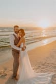 I bought this dress for my beach wedding and absolutely loved it! It fit so well! I did need to get alterations for the length, but it worked out perfect bc I made a couple other changes to it. I changed the neckline to a sweetheart and added rhinestone trim to it. I highly recommend this dress! You will receive so many compliments and you won't regret it! - Heather D.