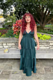 Love this dress, fun and cute, good quality. I'm 5'3 and got it hemmed for length with a 3 inch heel.  I also got the chest tailored as it was gapping a little on the sides. If you have a smaller chest I would size down, it is roomy in the skirt.  Lulus was great with returns of the dress I decided against for this event as well. - Jenna P.