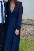 Absolutely loved this dress. Got it for a Fall Wedding in Canada. I got so many compliments and got asked multiple times where I had gotten it from. I loved the fact that it's a wrap dress and can easily adjust to my size. Had to get it hemmed (already knew this before purchasing the dress - the dress does however have an inner lining which poses an extra challenge for those trying to hem it at home). The cleavage was a bit too much for what I'm comfortable with, but with help of boob tape instead of a bra, and double-sided fashion tape to keep the dress in place, I was very happy with the result. If needed, the cleavage could be adjusted with a safety pin or a tank top/bralette. It was a great dress to stay warm in an outside wedding ceremony in October, although you will feel the wind through the thin sleeves. I did however get extremely hot in the dress when the party was moved inside and the dancing begun. - Gabriela P.