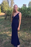 This Dress is even more stunning in person. The material has a lovely medium to light weight to it, and the fact that it is lined makes it even more comfortable! It is up there as one of the most comfortable special event dresses I have ever worn. The fabric is stretchy but not flimsy. I received many compliments for the fit and style of this dress. I would highly recommend this style, I absolutely loved it and look forward to the next semi formal or formal event I can wear it at! - Eva W.