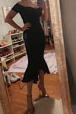 Those dress is beautiful, the material is thick and very flattering, it hugs every curve perfectly, Just a gorgeous classy dress for any formal occasion. I've added a photo, please excuse the sheet protecting from faux spray tan = - Leslie M.
