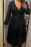 Super cute and comfortable. Shows quite a bit of cleavage but it can be adjusted a little by tying the dress as tight as possible. - Ashley D.