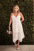 We eloped in Las Vegas and I wanted something fun and less traditional than an actual bridal gown. This was perfect. It was fun, lightweight and still felt very bridal. It was a little tight - I needed help getting zipped in, but still fit and looked great and I was very comfortable in it all night. - Katie B.