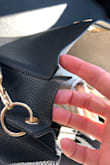 i am so bummed because i think this bag looks so cute and goes with most outfits. Unfortunately, the seam is already tearing and the strap that attaches to the bag is breaking after only 2 weeks. Lulus is my main online shopping site and never have had issues like this before so maybe it's just bad luck. - Shannon S.