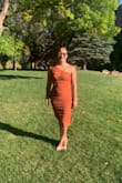 Very light material, fit comfortably, probably could have opted for the large but xl was more forgiving in the mid section. - Emily M.
