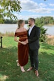 I absolutely LOVE this dress! I wore it for my brothers wedding while 26 weeks pregnant and it fit beautifully. Pre-pregnancy, I usually wore a small, but I sized up to a medium to accommodate the bump and it was perfect! The color is a stunning copper and the material is thick and good quality. - Katy D.