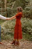 I wore this dress for my engagement shoot and it fit perfectly. The color was stunning and the dress fit like a glove. I highly recommend! - Paige N.