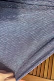 The picture showed a light blue shiny dress but in real life its kind of dark purply. The chest part is very loose on me (which was too be expected) even though it is adjustable. - Lucy M.