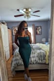 The green is vibrant and almost teal. This was for a wedding and was one of many dress options I had purchased. Overall, the dress design itself didn't wow me and can be tricky if you're busty. I did like it, but not enough to keep. - Imani T.