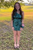 Loved this dress and got so many compliments. The dress was comfortable and fit well. Shipping was faster than expected too. - Tomie A.