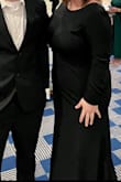 I bought this dress for a family wedding. I've recently gained 20-25lbs and dress shopping wasn't easy.  In the end, I decided to buy whatever would cover it all up and hope for the best. This dress did the job. I purchased a 1X and honestly could have gotten away with an XL, even though XL in other designs were too small. - Adriana A.