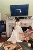 I chose this dress for my wedding. It fit me perfectly. The top isn't super comfortable since it's a structured corset but it's still wearable and I feel very beautiful in it. I'm 5'2 and the dress is LONG. I love the train but I'm getting the front hemmed so I can still walk in it. - Jessica S.